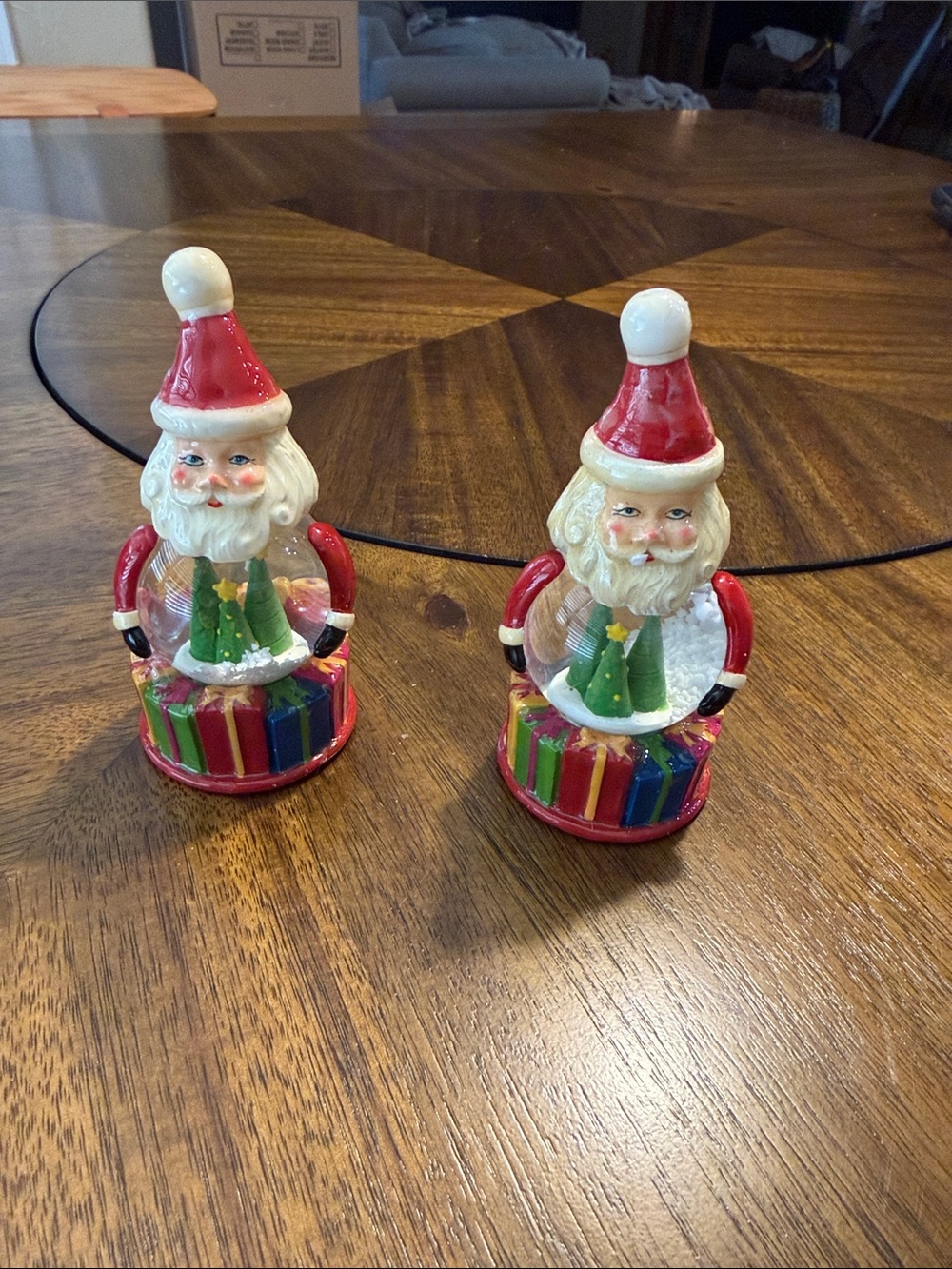 Neiman Marcus Red Santa Snow Globe Pair with Multicolor Gift Bases